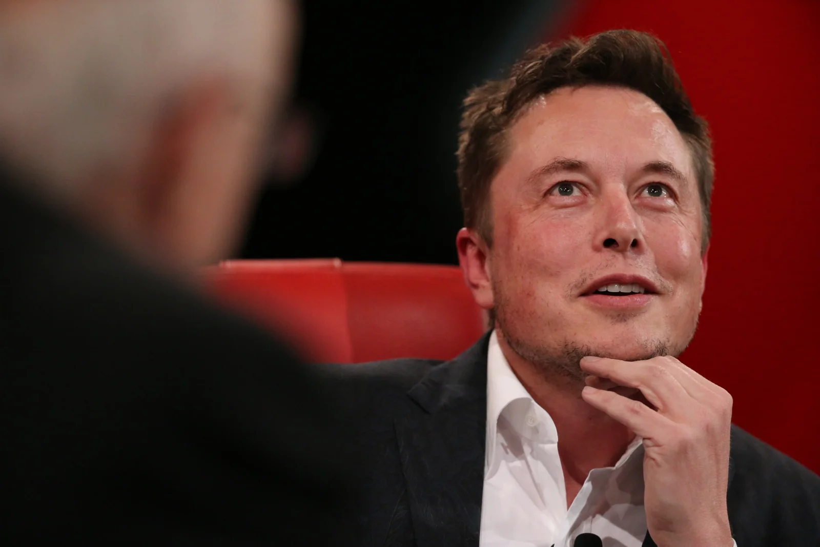Elon Musk speaking at a technology conference